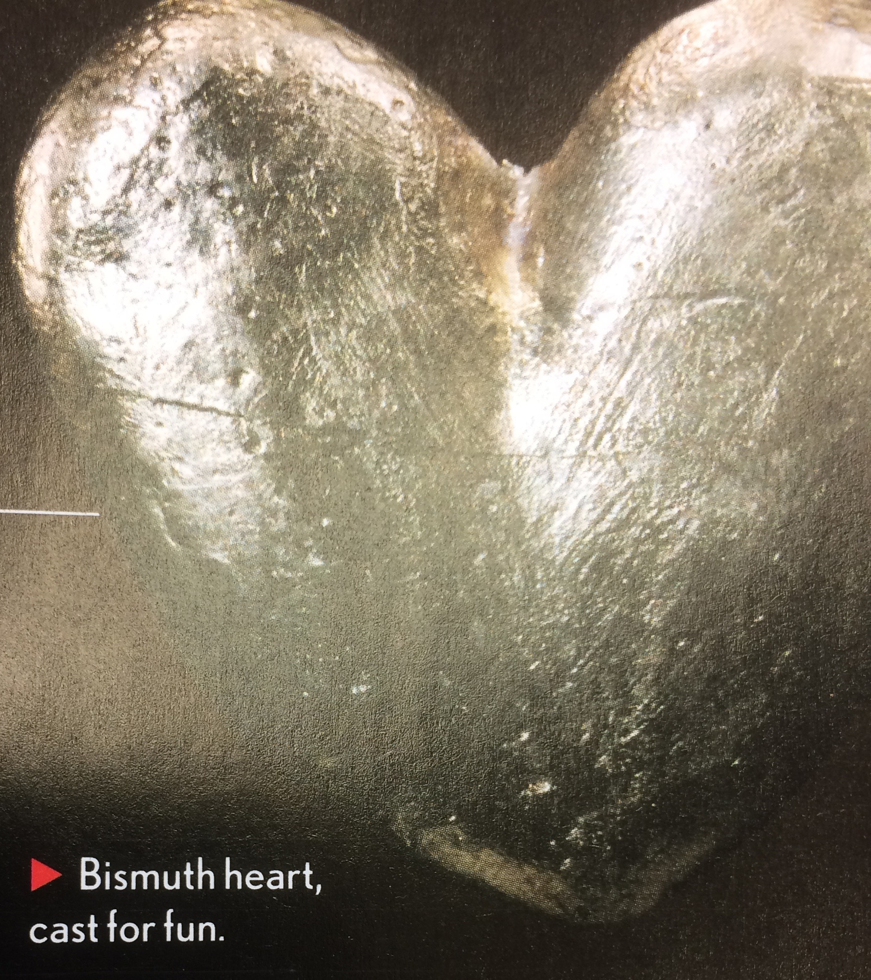 image of a heart cast out of bismuth